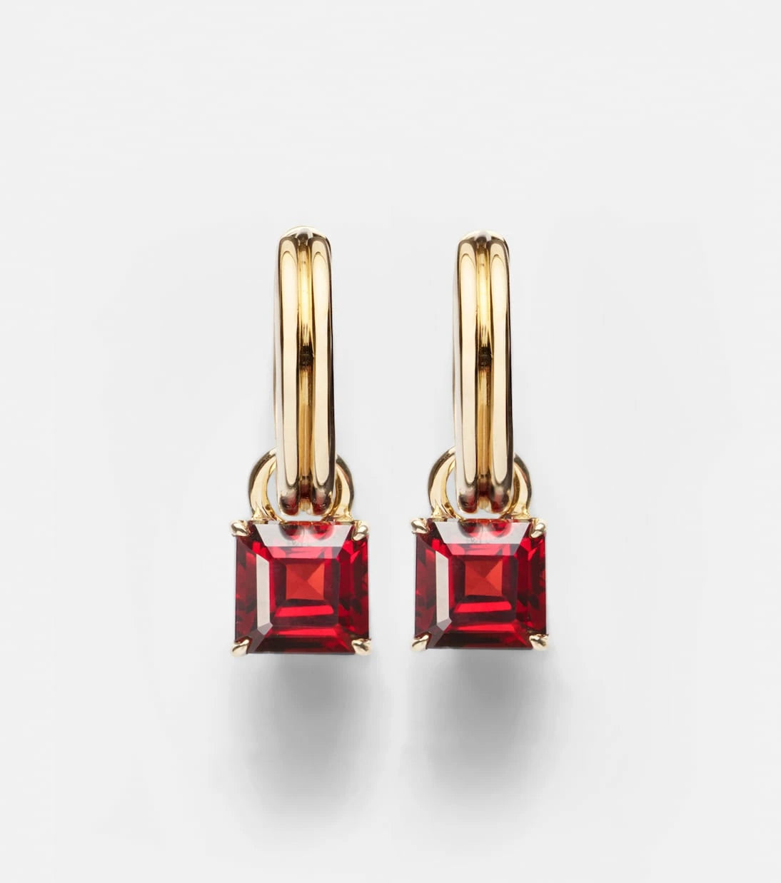Stone and Strand - 10kt gold earrings with garnets