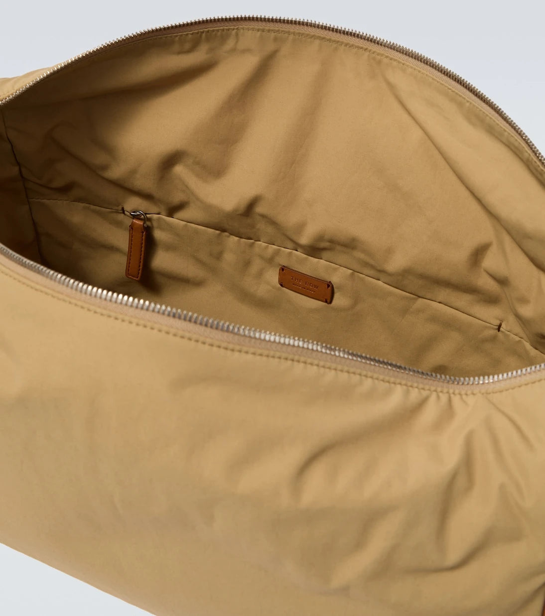 The Row - Logan E/W leather-trimmed crossbody bag