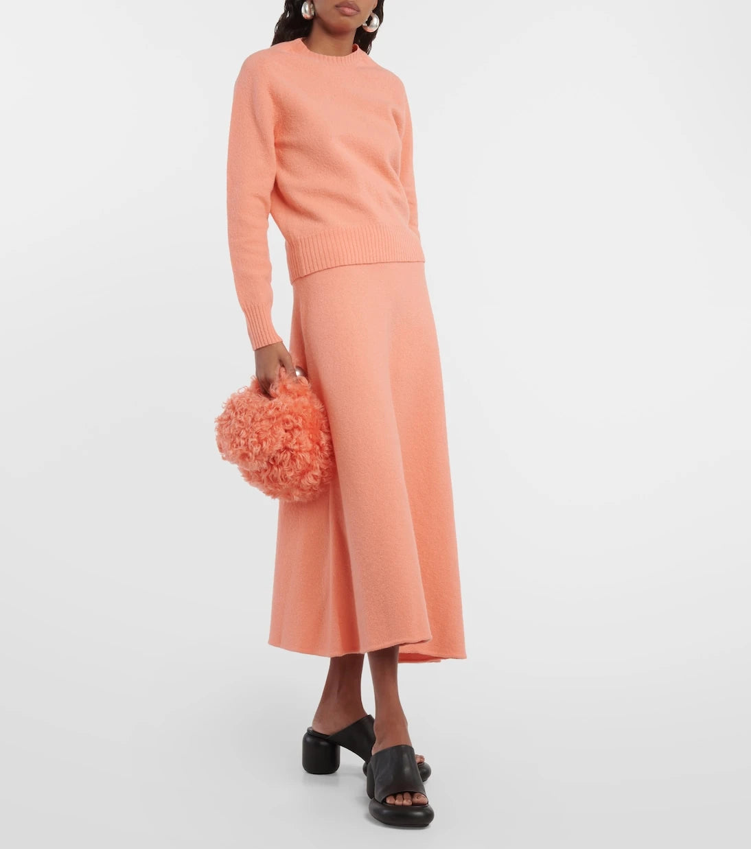 Jil Sander - تنورة متوسطة الطول من الصوف بخصر مرتفع وتصميم غير متماثل