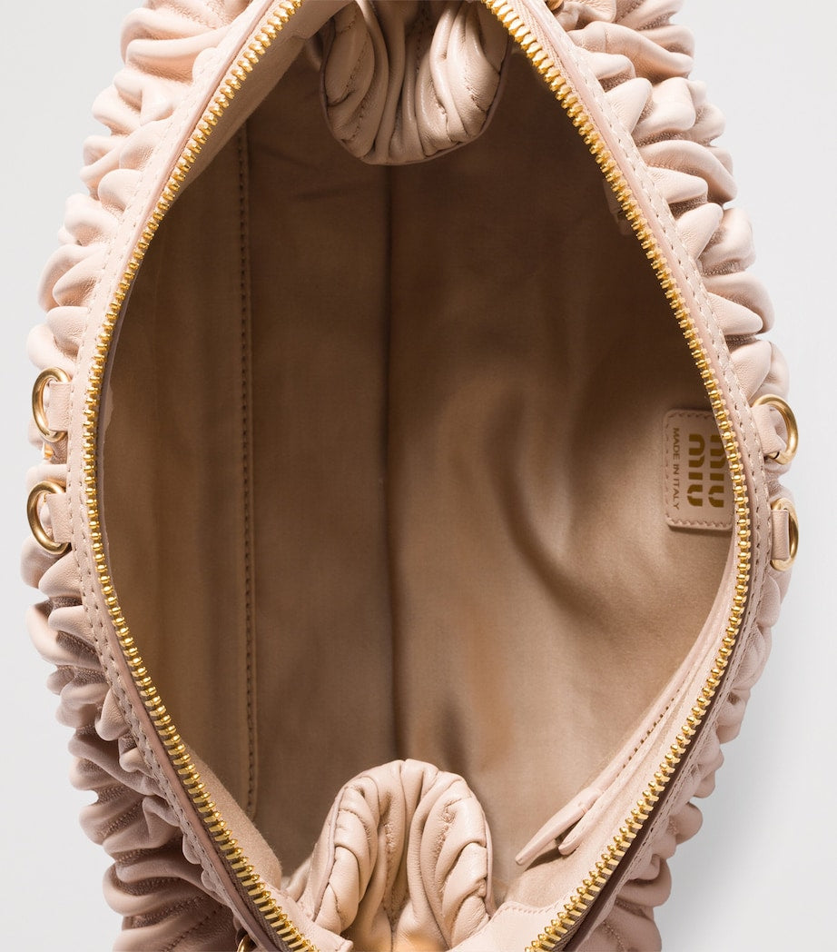 Matelassé Leather Clutch Bag