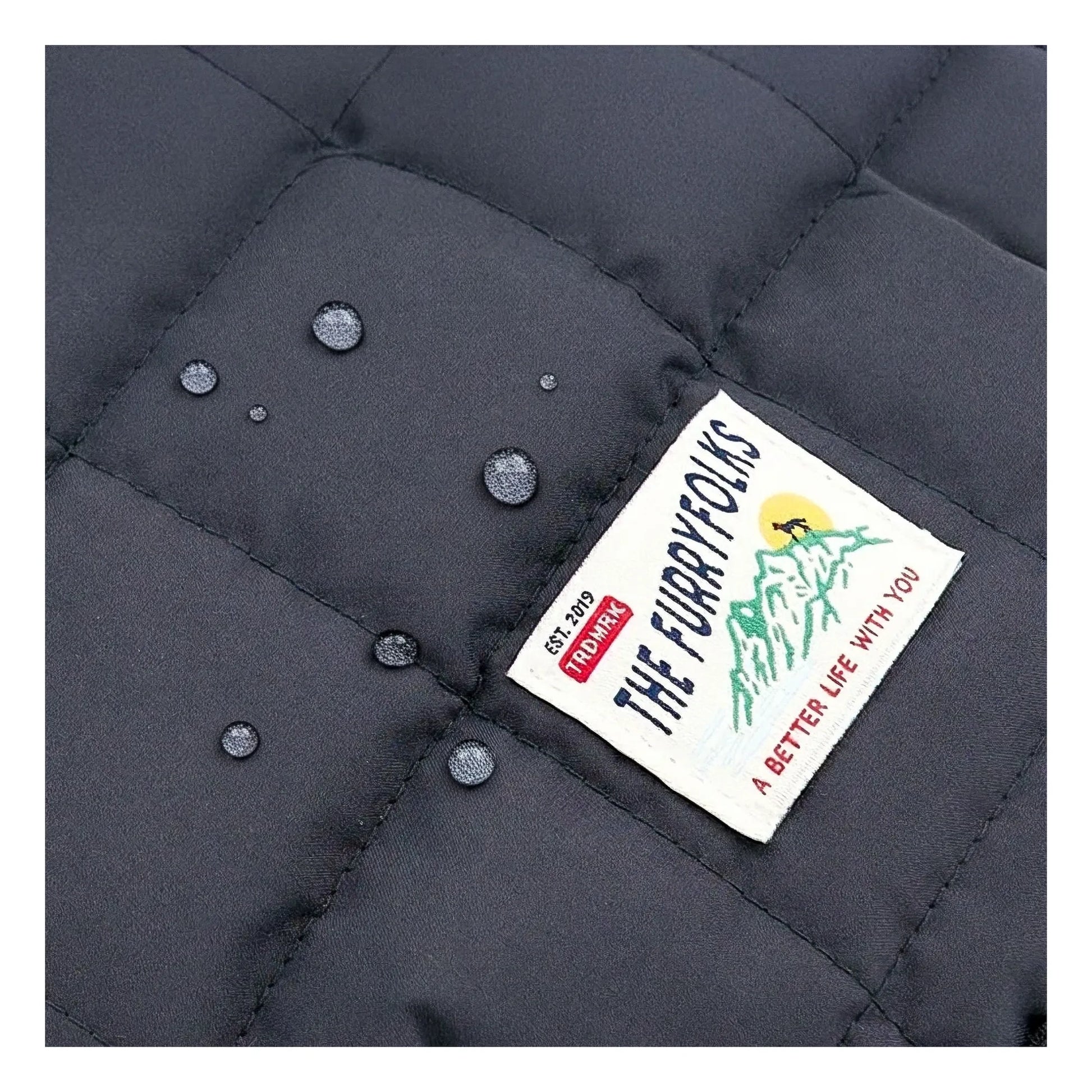 The Furry Folks - Reversible down jacket | Black