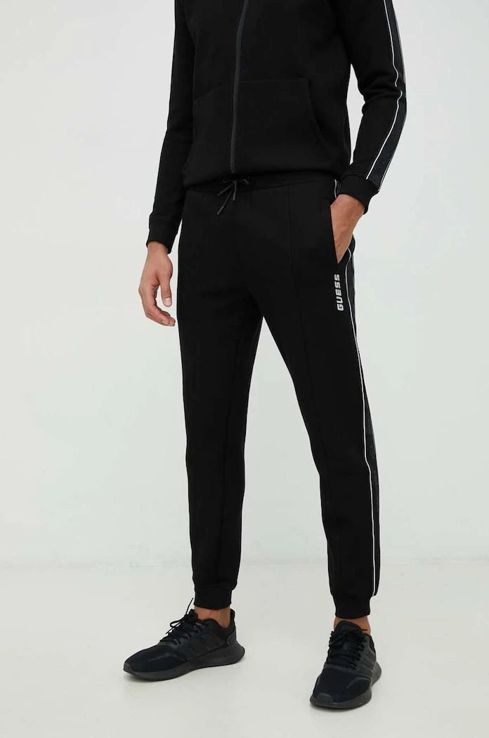 Guess pamuklu erkek spor pantolon MICKEY