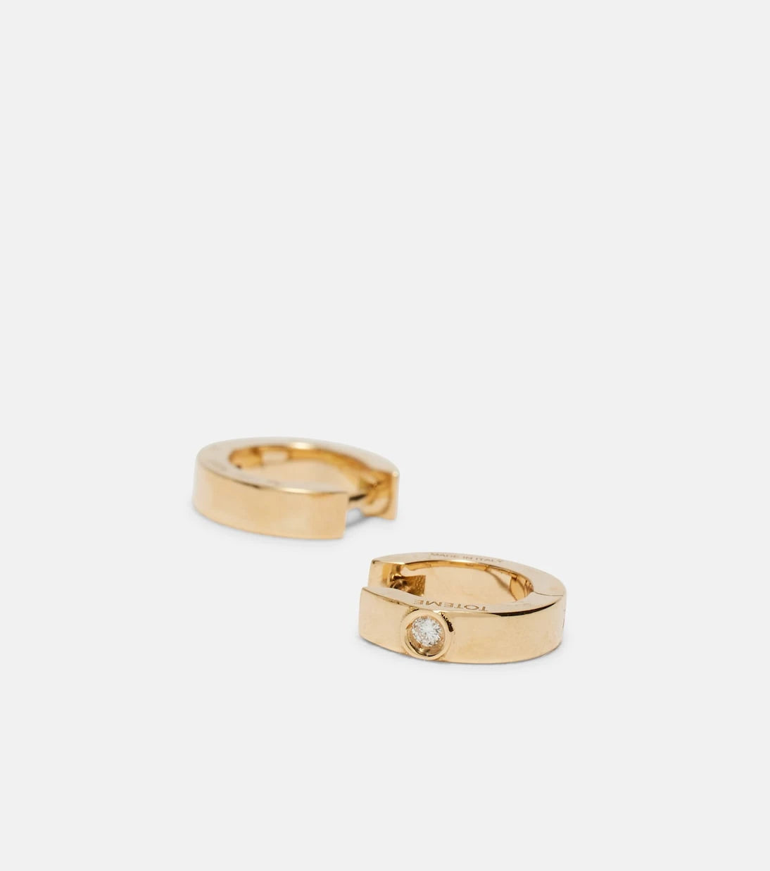 Toteme - 18kt gold hoop earrings with diamond