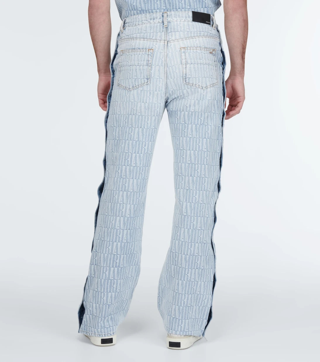 Amiri - Logo jacquard denim pants