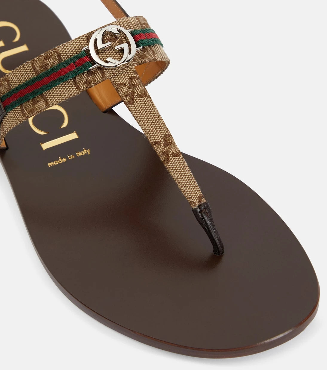 Gucci - صنادل ثونغ مزينة بالجلد