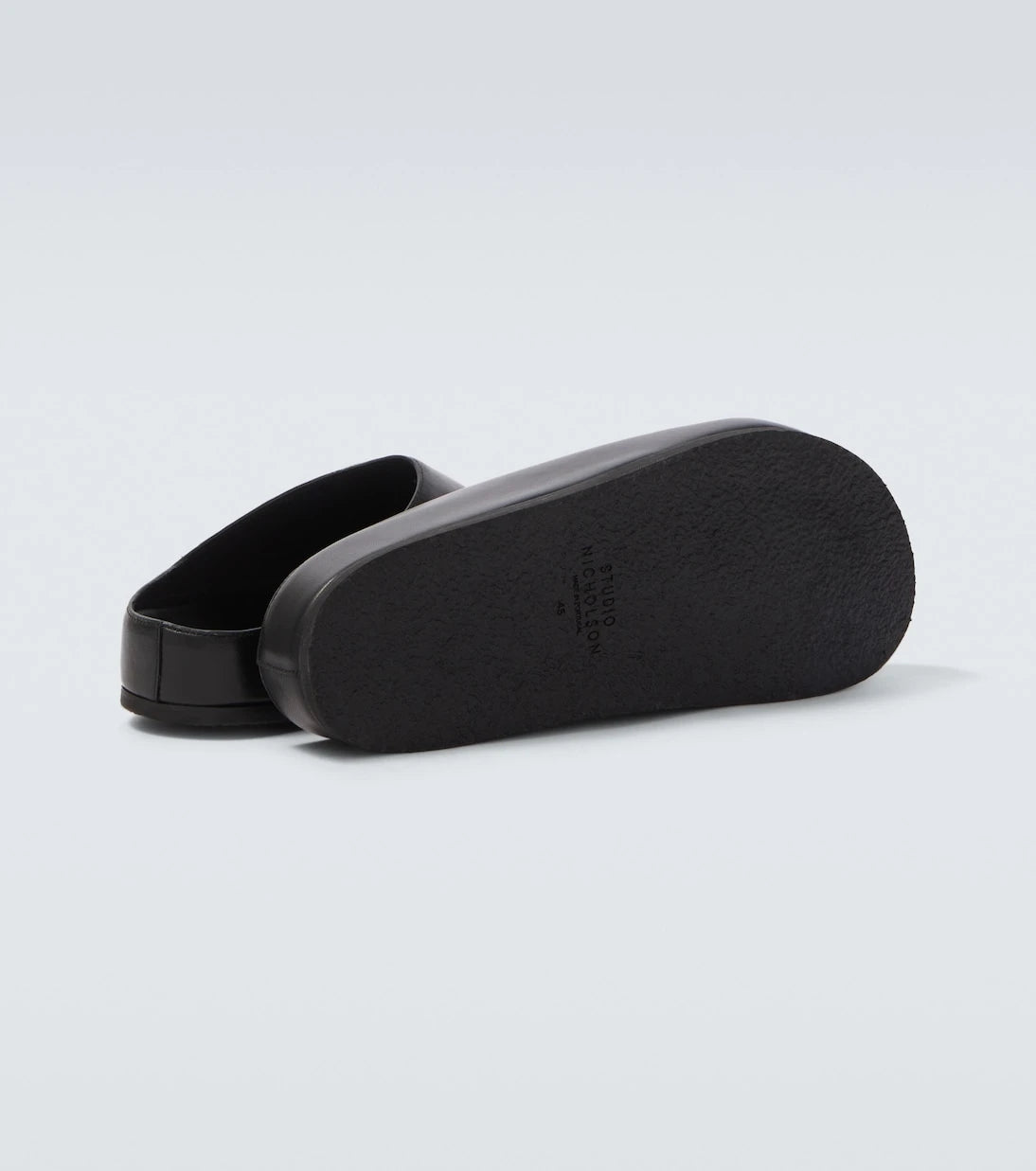 Studio Nicholson - Wearing leather mules