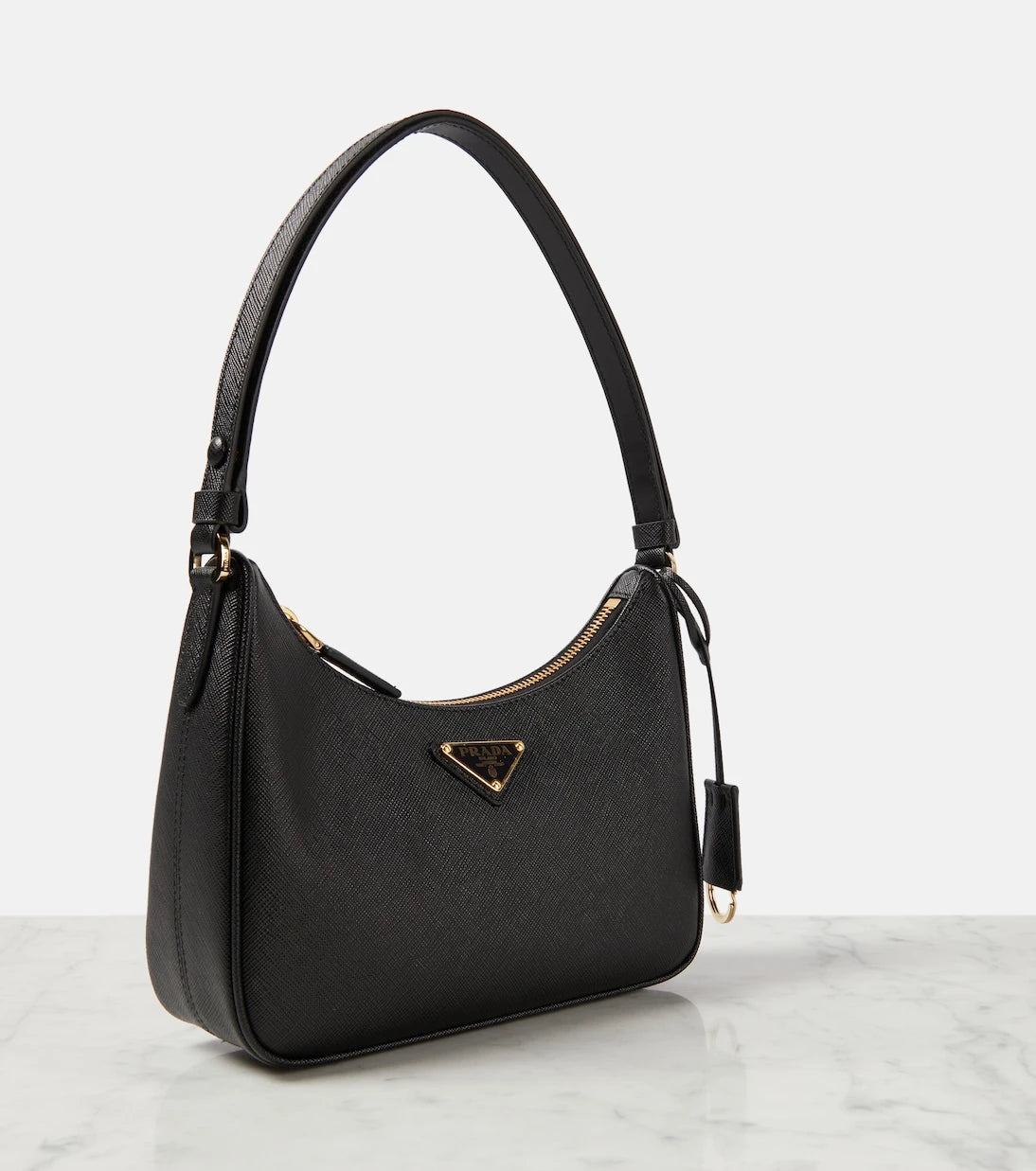 Prada - حقيبة كتف Re-Edition Mini من الجلد