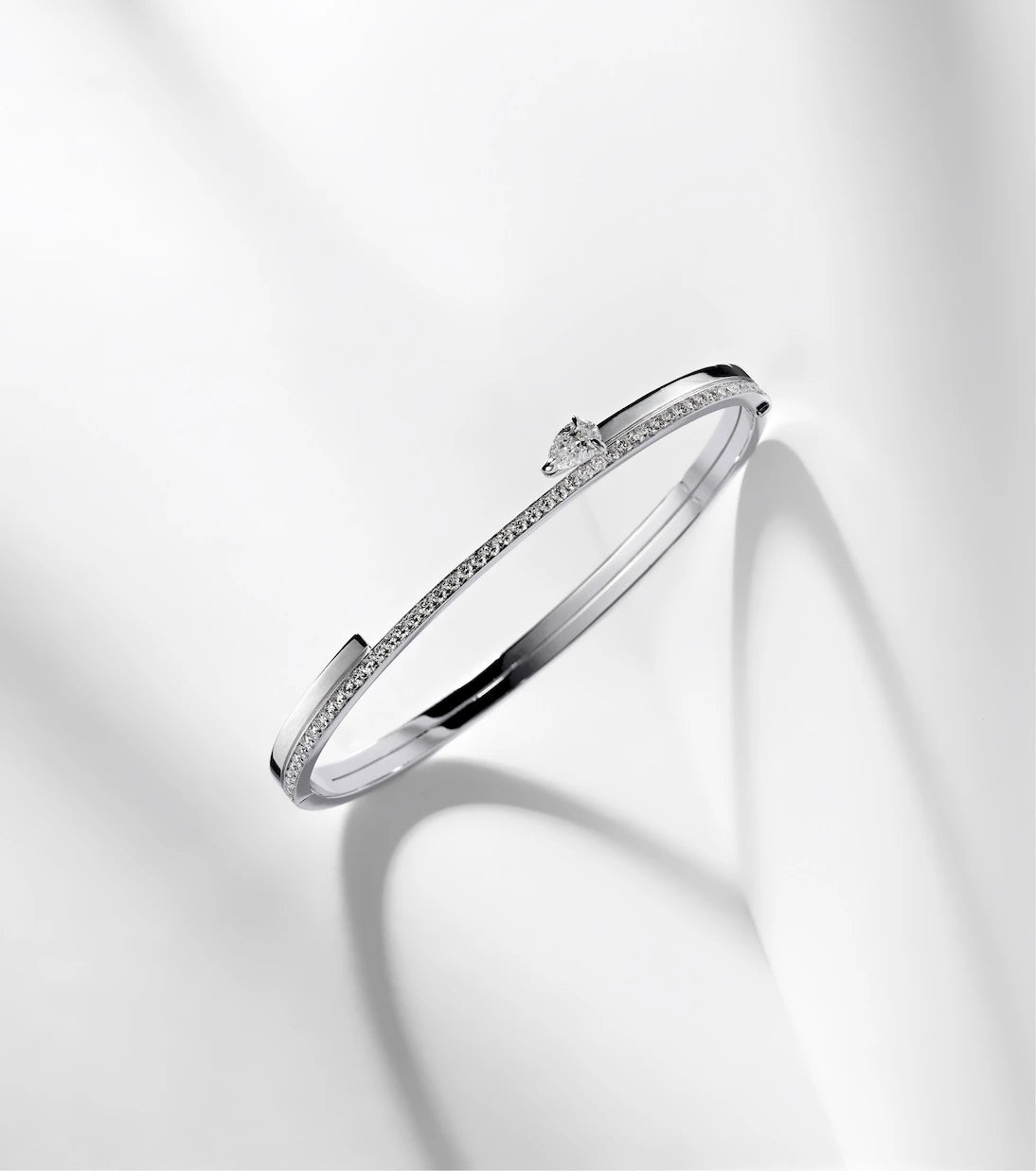 Repossi - Serti Sur Vide 18kt white gold bangle with diamonds