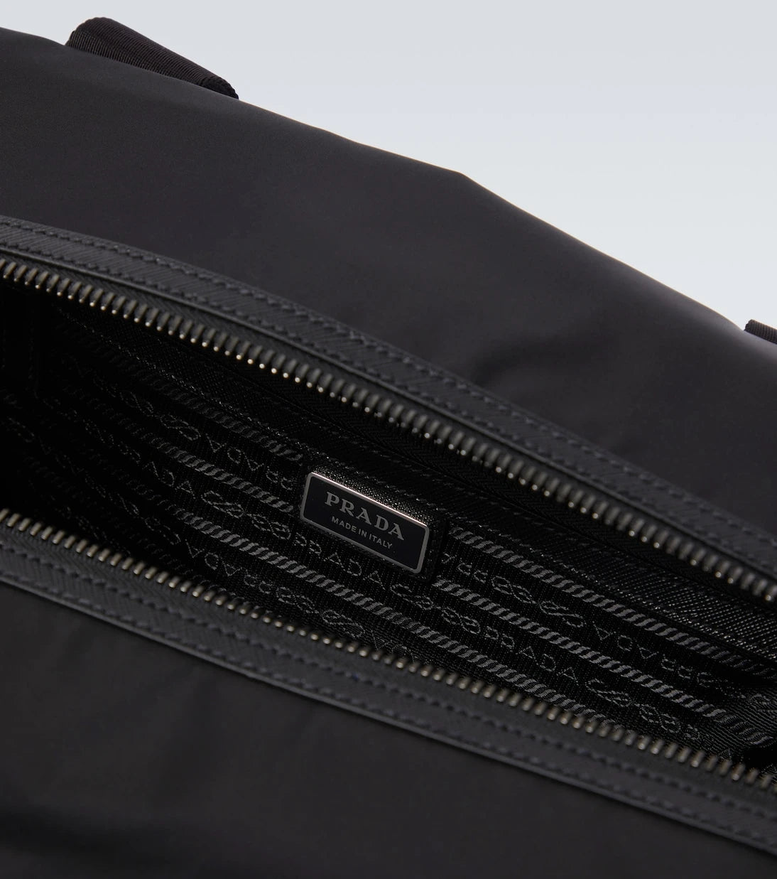 Prada - Re-Nylon leather-trimmed duffel bag