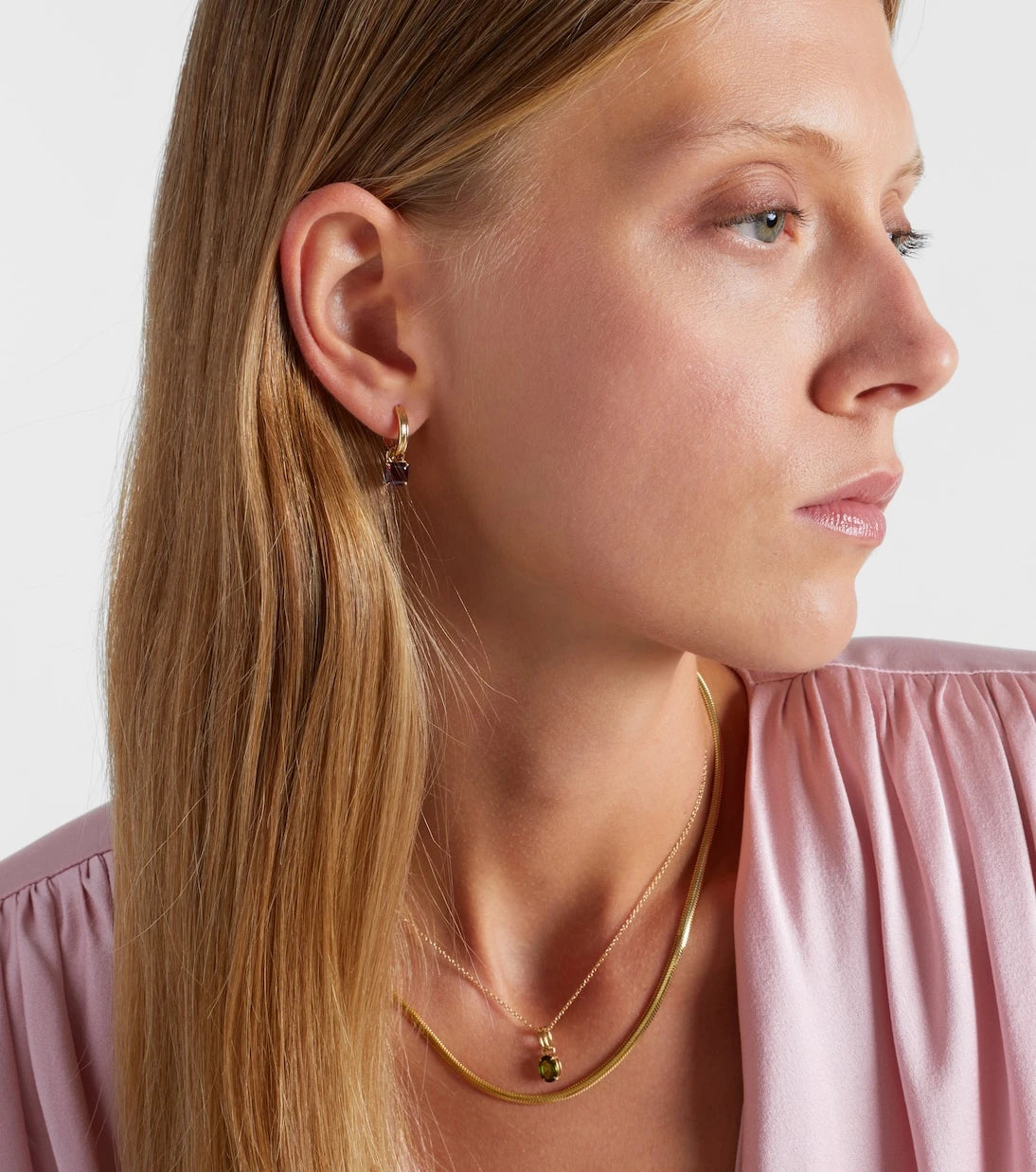 Stone and Strand - 10kt gold earrings with garnets