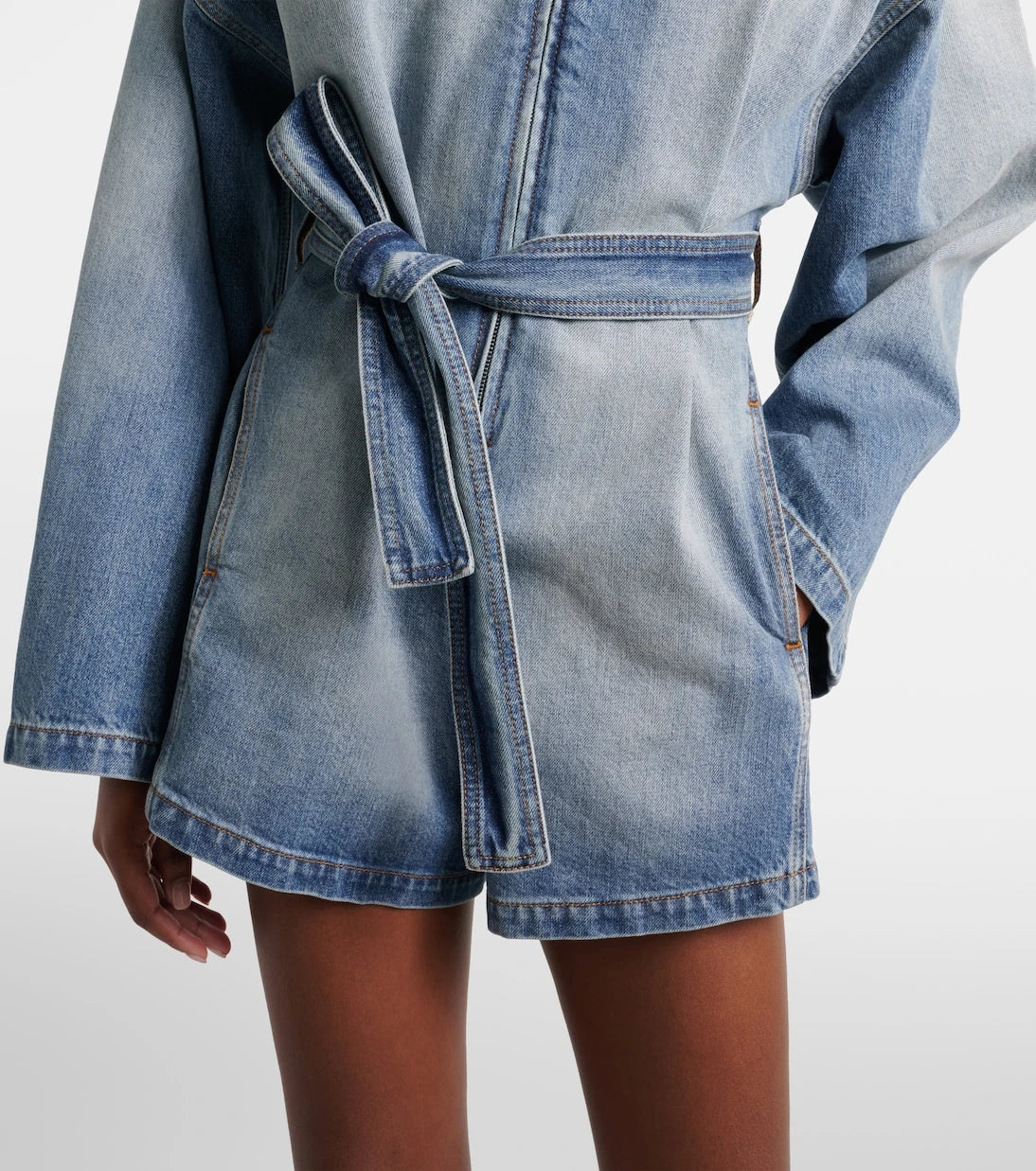 Alaïa - Belted cotton denim romper