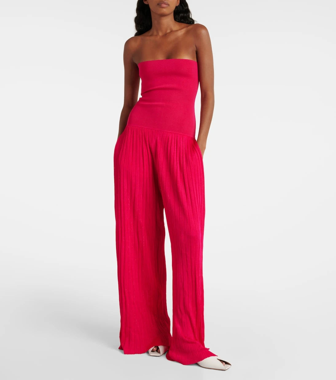 Alaïa - Strapless pleated knitted jumpsuit