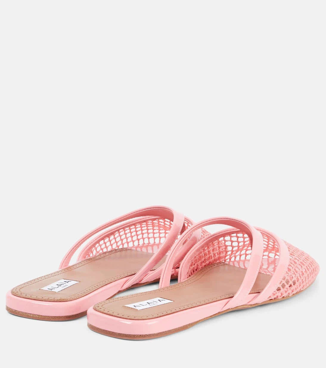 Alaïa - Patent leather-trimmed fishnet mules
