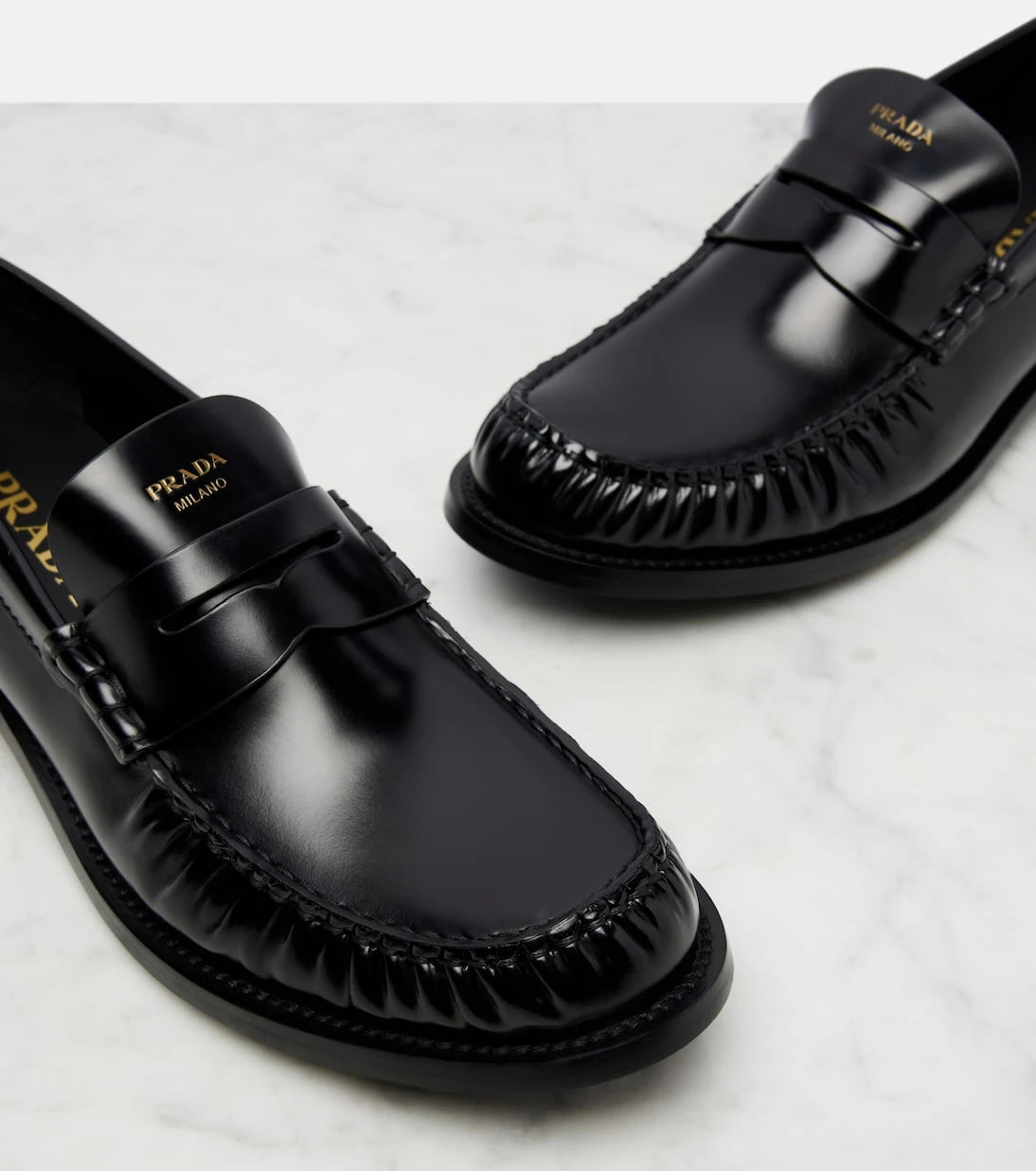 Prada - Leather penny loafers