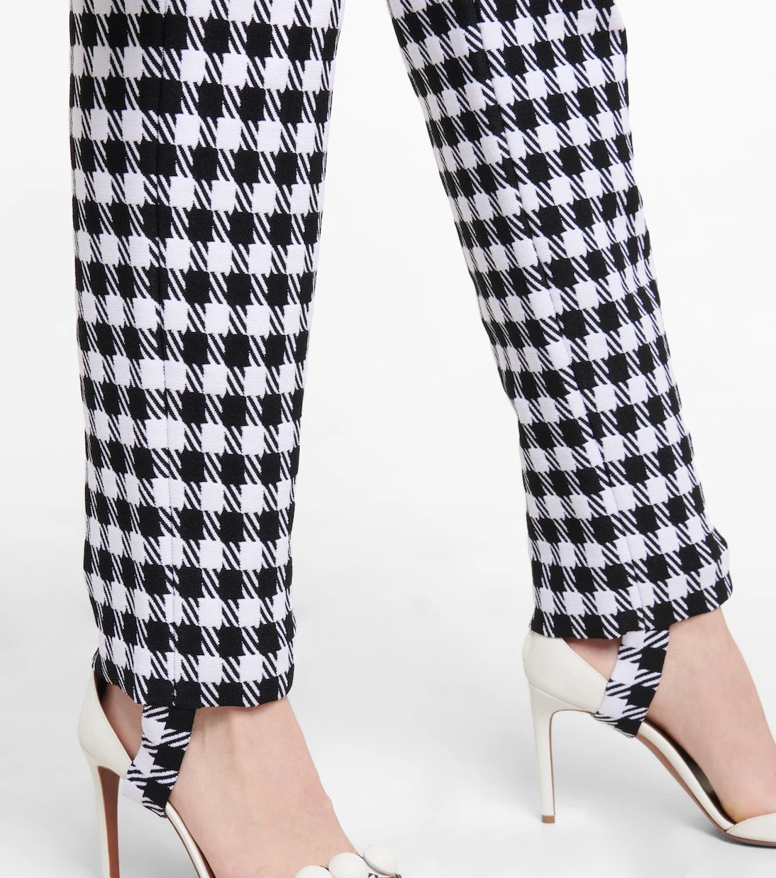 Alaïa - High-rise checked stirrup pants