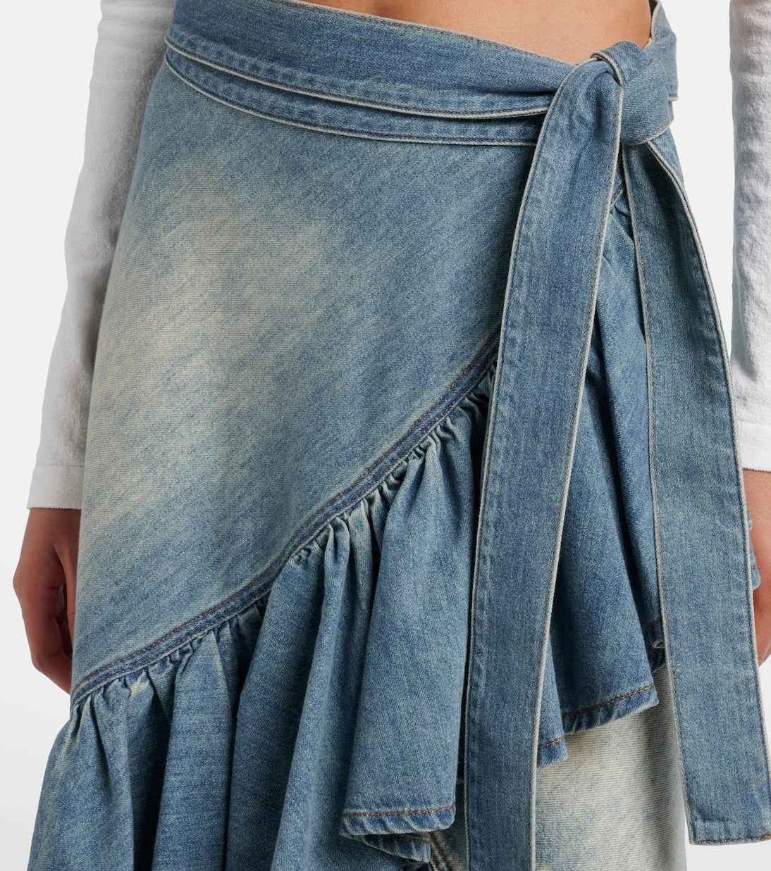 Alaïa - Ruffled denim wrap skirt