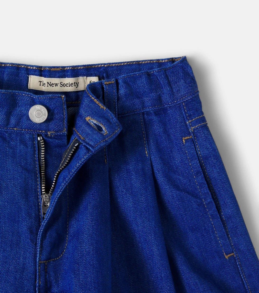 The New Society - Tulip pleated denim shorts