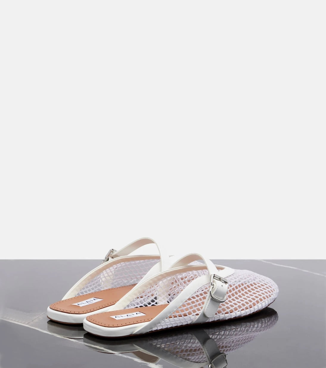 Alaïa - Fishnet leather-trimmed slip-on mules