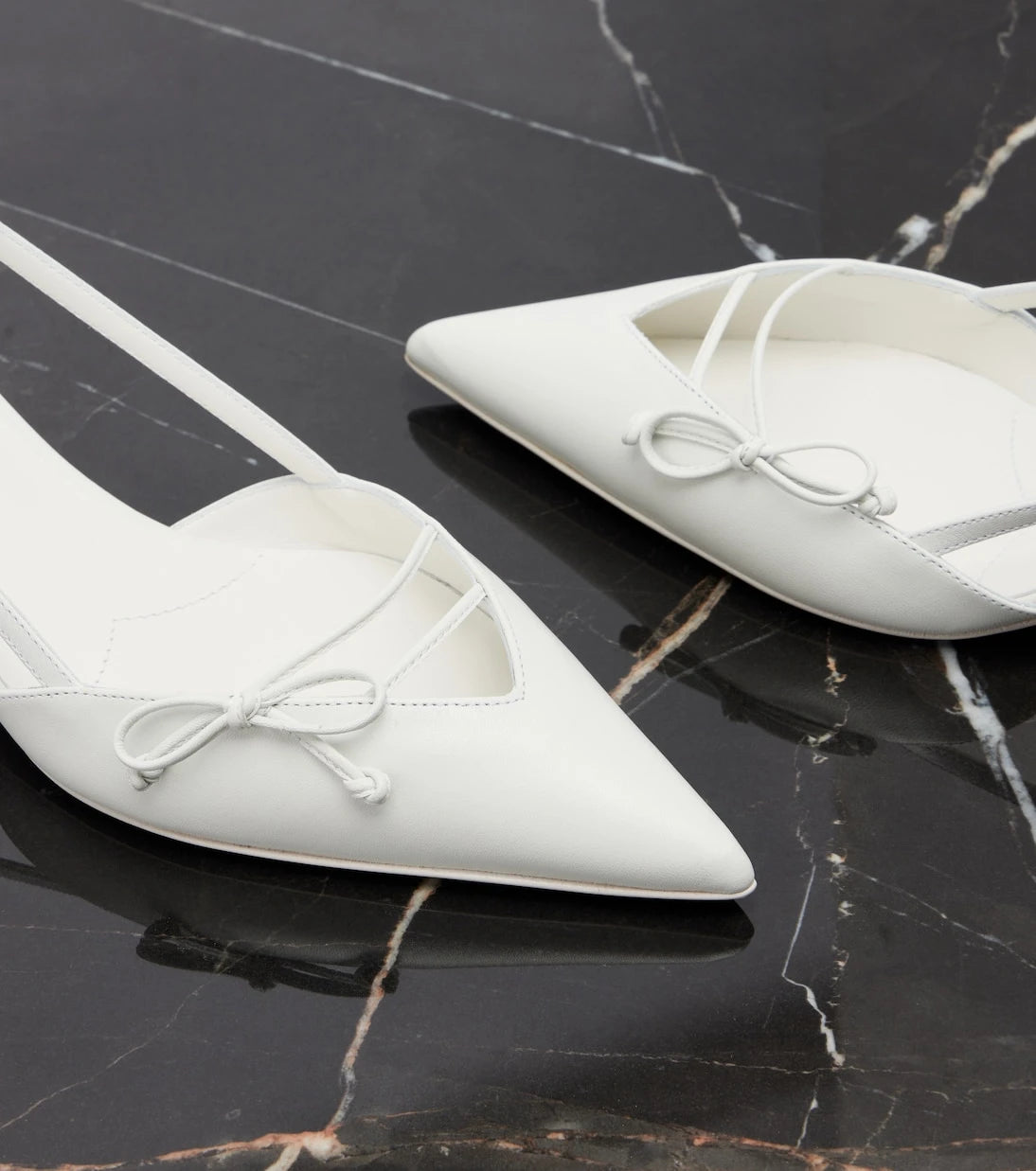 Prada - Bow-detail leather pumps