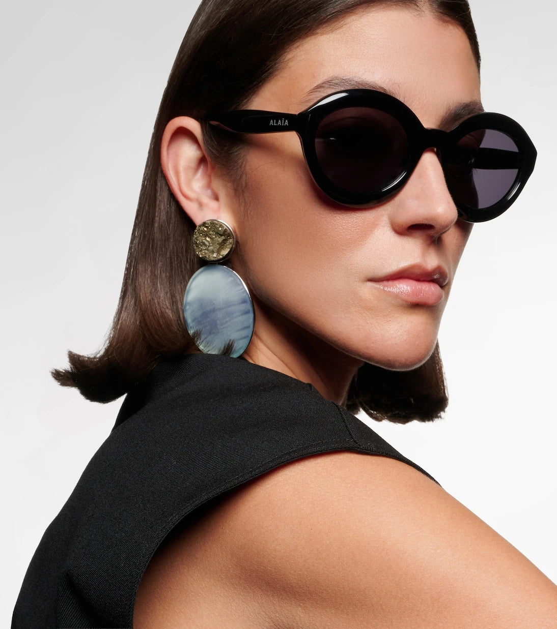 Alaïa - Lettering Logo round sunglasses