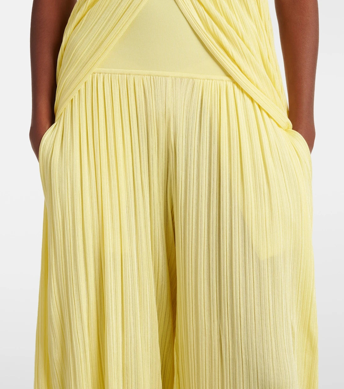 Alaïa - Pleated high-rise jersey straight pants