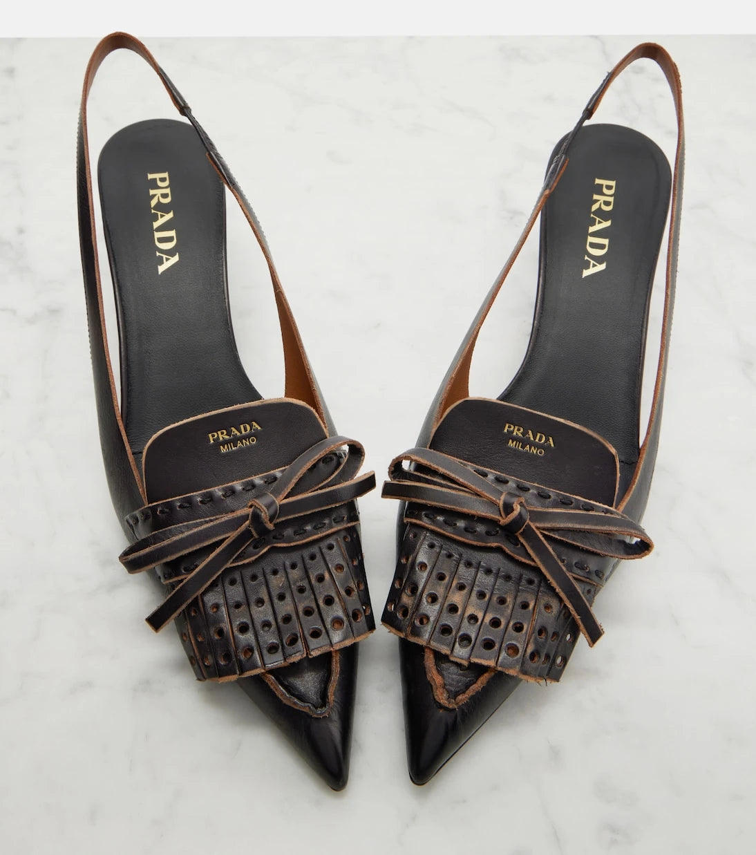 Prada - Bow-detail fringed leather slingback pumps