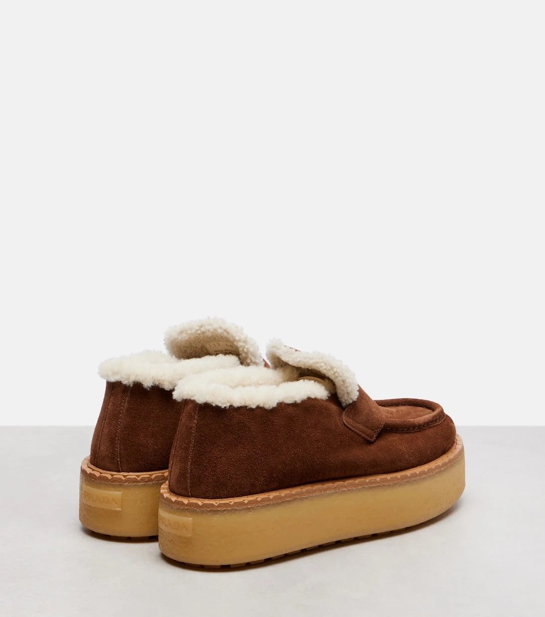 Prada - Shearling-lined suede loafers
