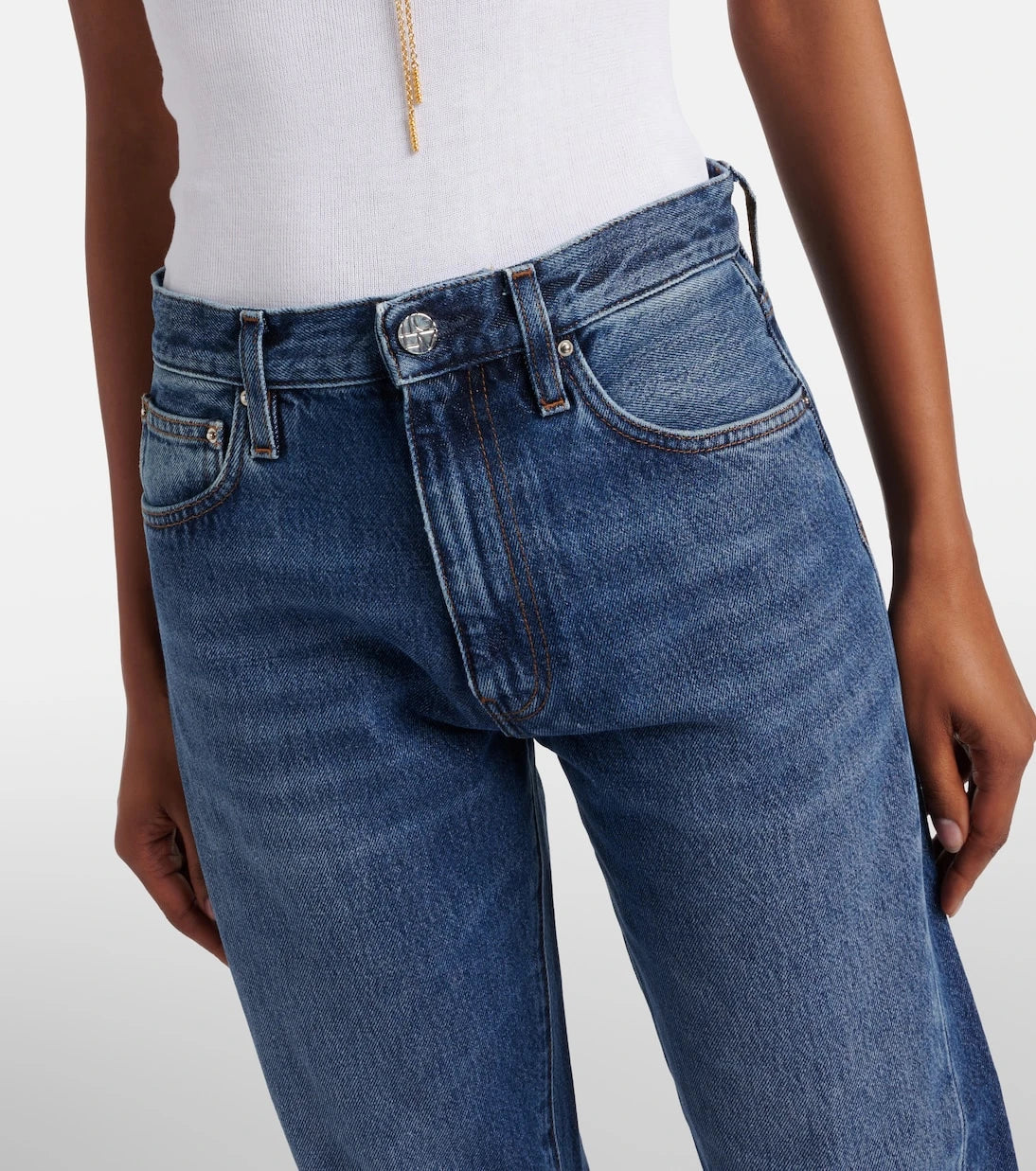Toteme - Mid-rise twisted-seam straight jeans