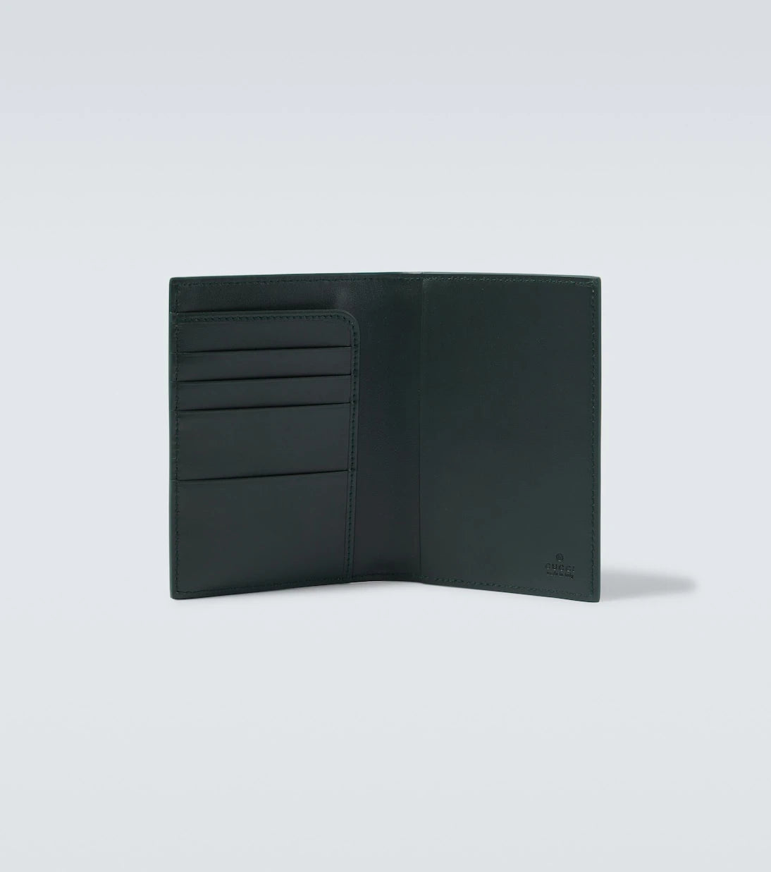 Gucci - GG Supreme leather-trimmed canvas wallet