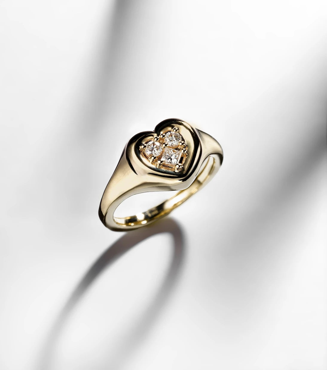 Stone and Strand - 14kt gold ring with diamonds