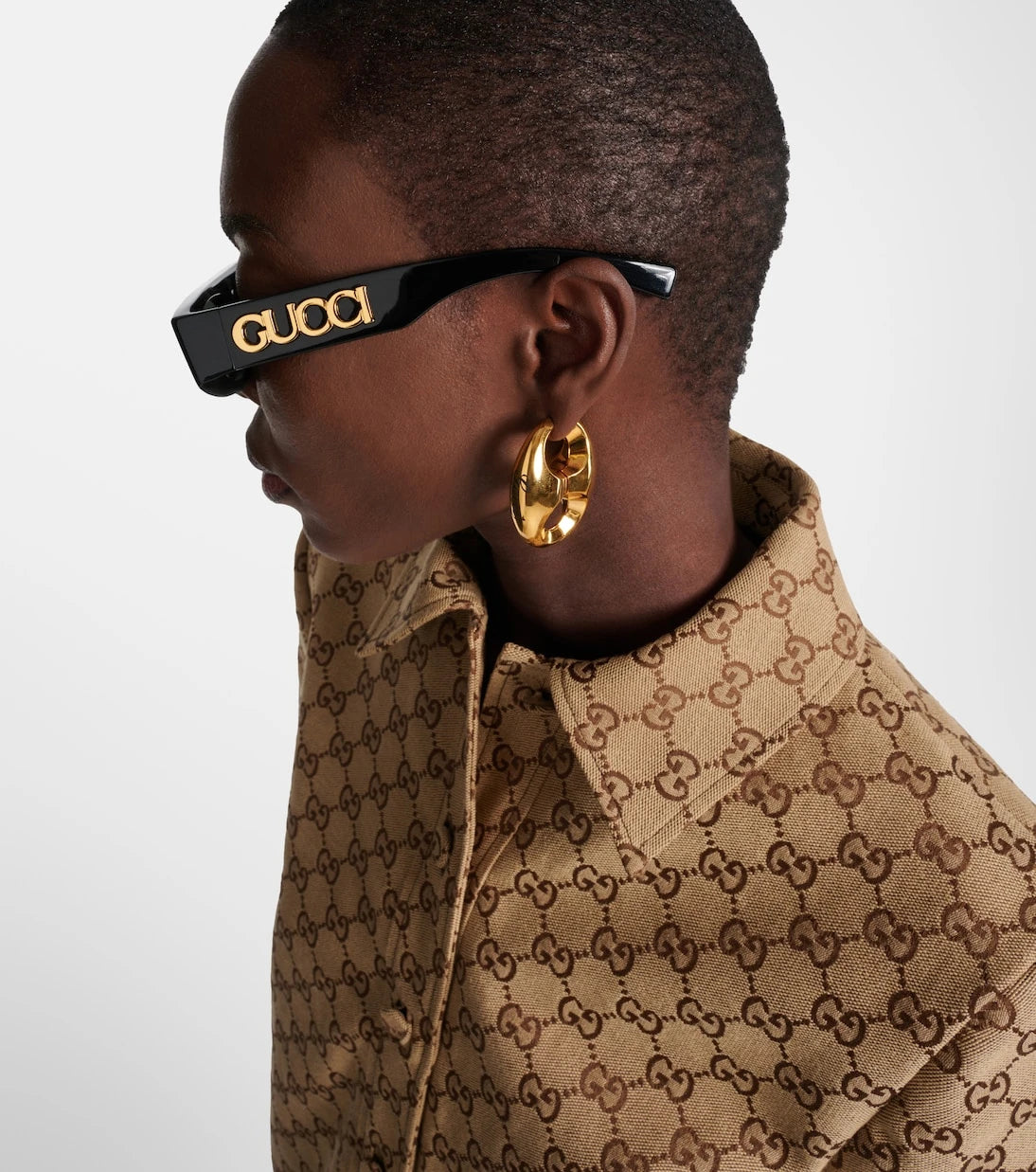 Gucci - نظارة شمسية مستطيلة بشعار