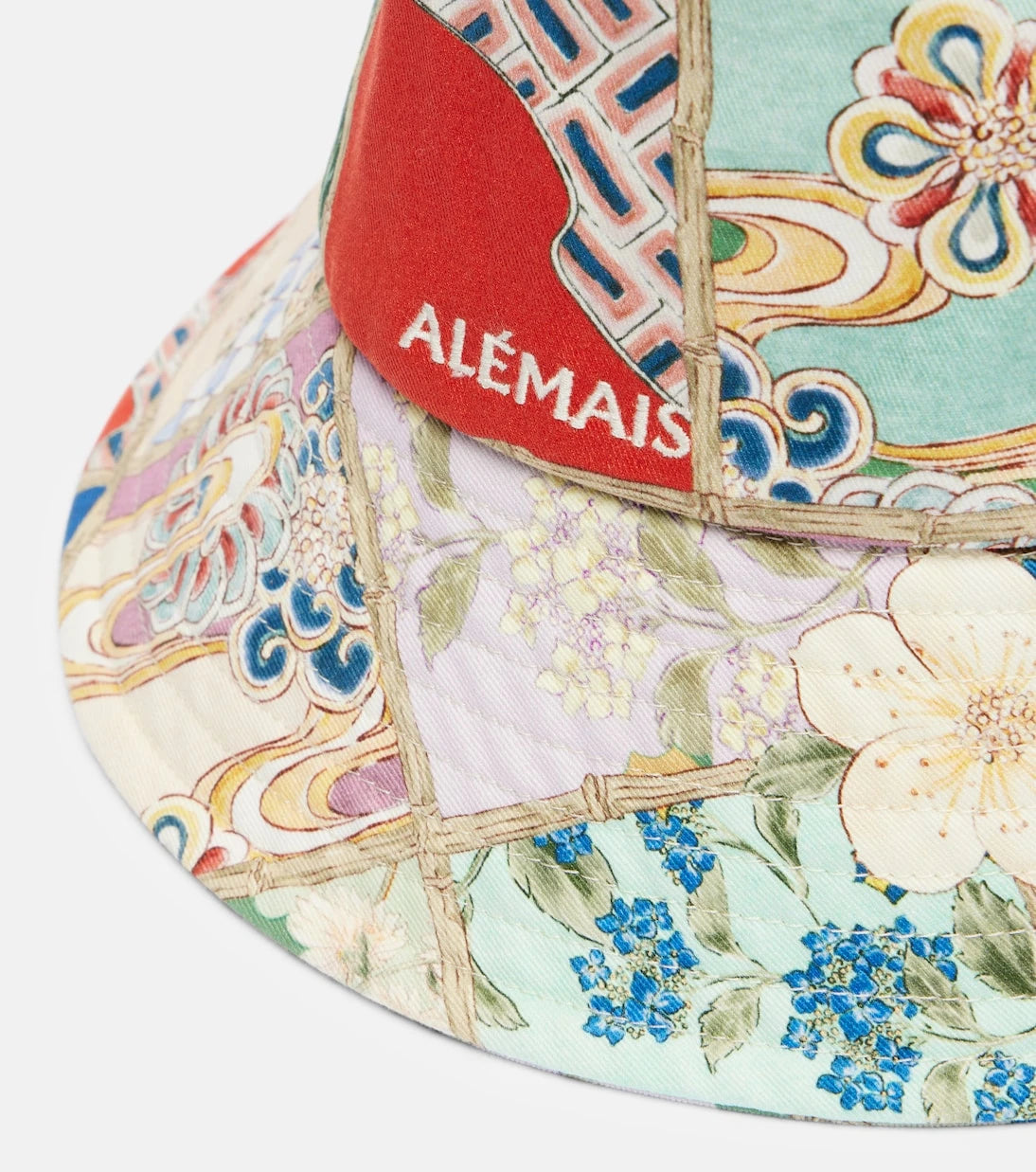 Alémais - قبعة دلو بيضاء من القطن بحافة مزينة بالزهور