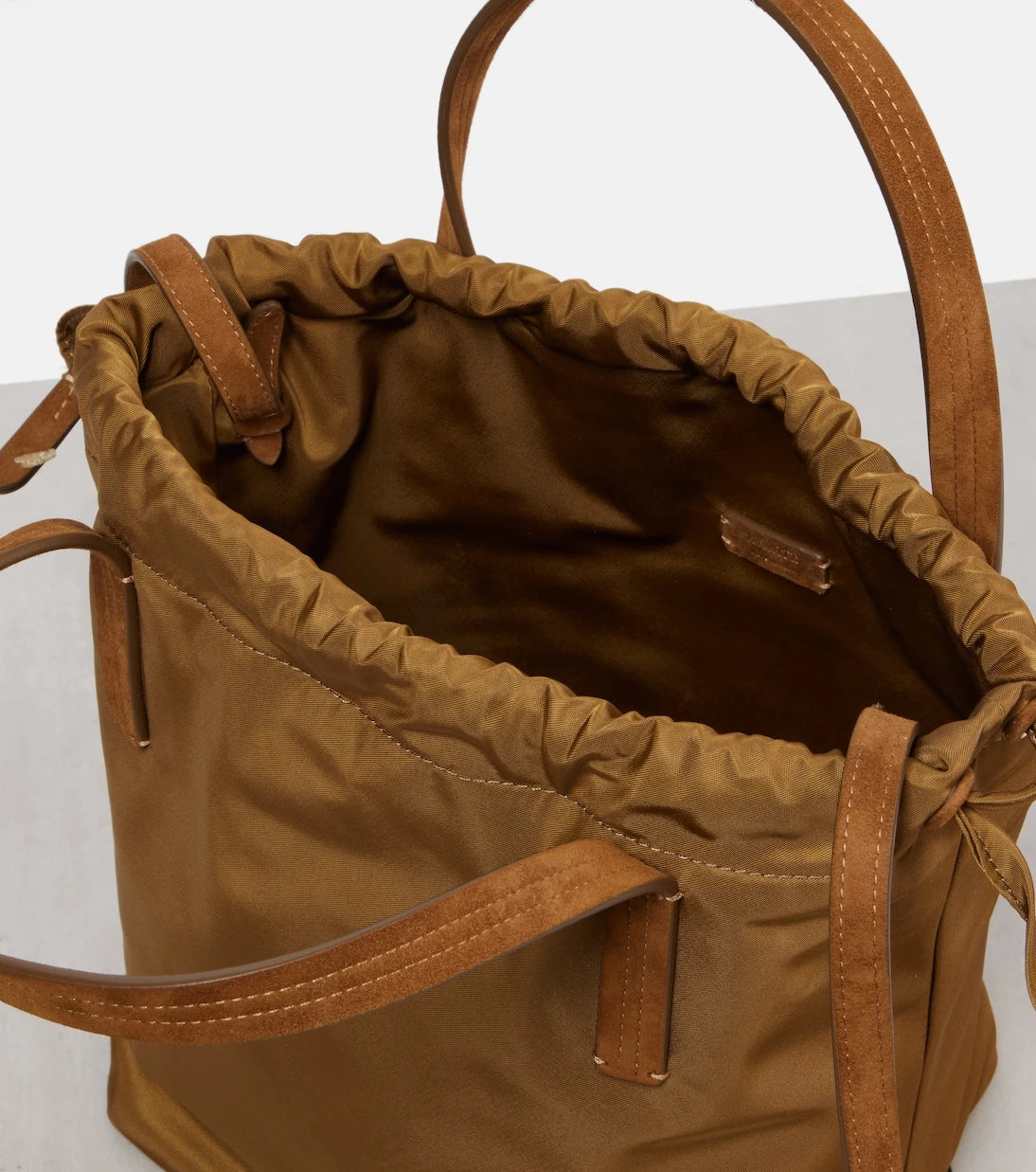 Khaite - Rory Medium leather-trimmed bucket bag