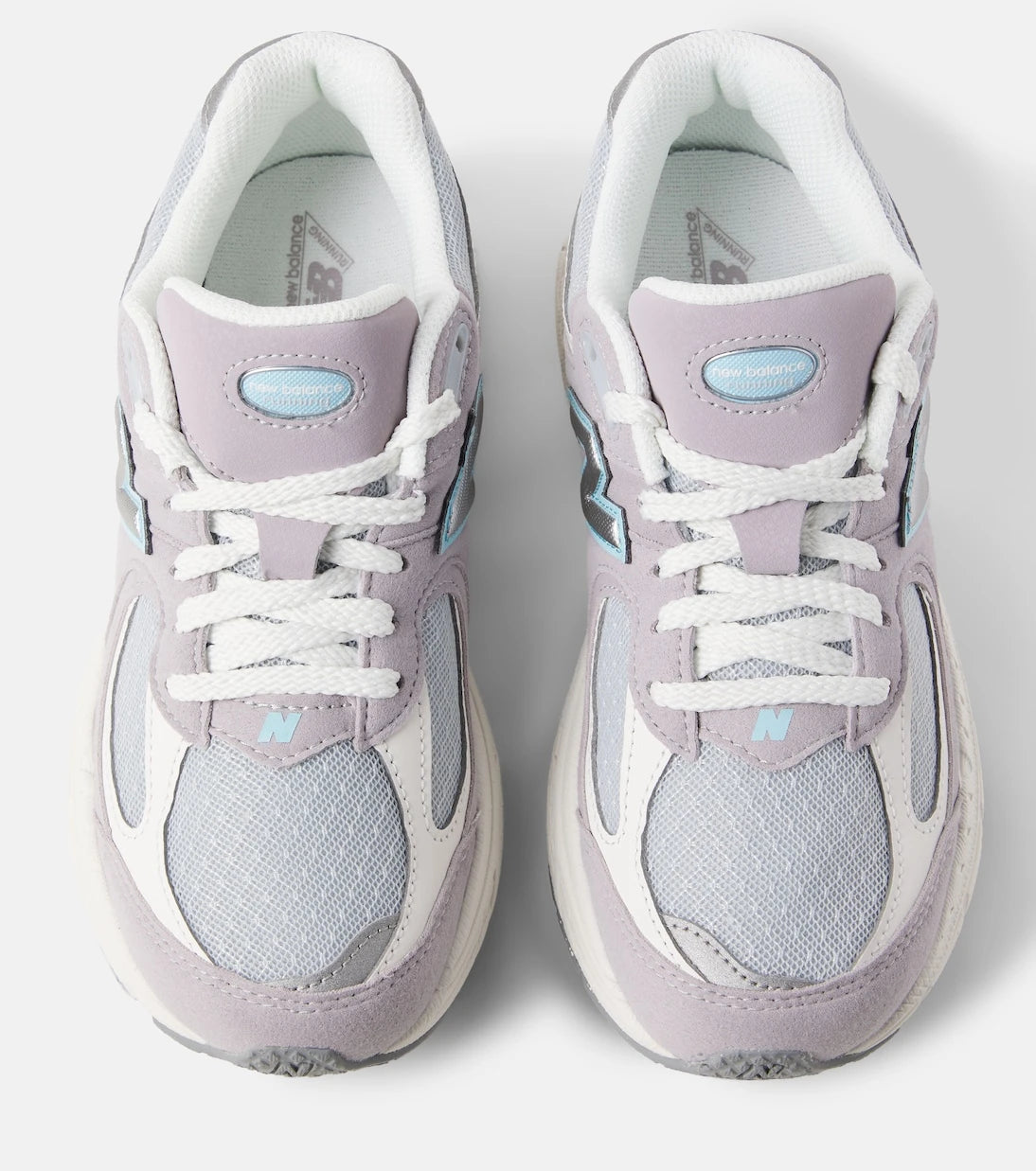New Balance Kids - حذاء رياضي 2002 بحواف من الشمواه