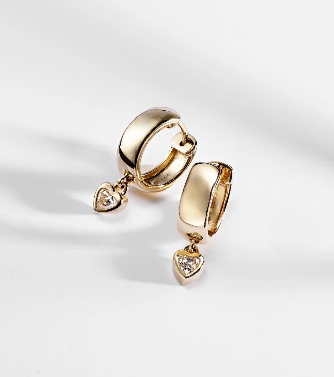 Roxanne First - 14kt gold hoop earrings with diamonds