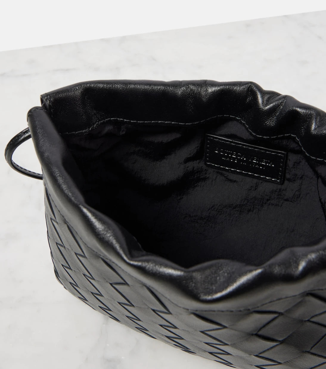 Bottega Veneta - Dustbag Küçük deri çapraz çanta