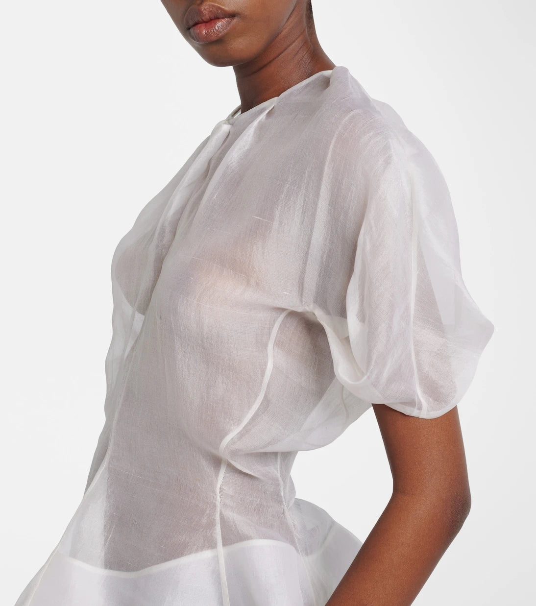 Khaite - Rumi sheer peplum silk top