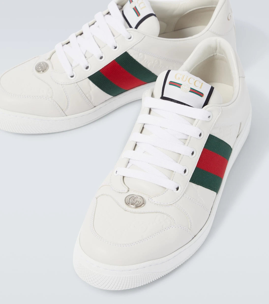 Gucci - حذاء سكرينر الرياضي من الجلد المنقوش