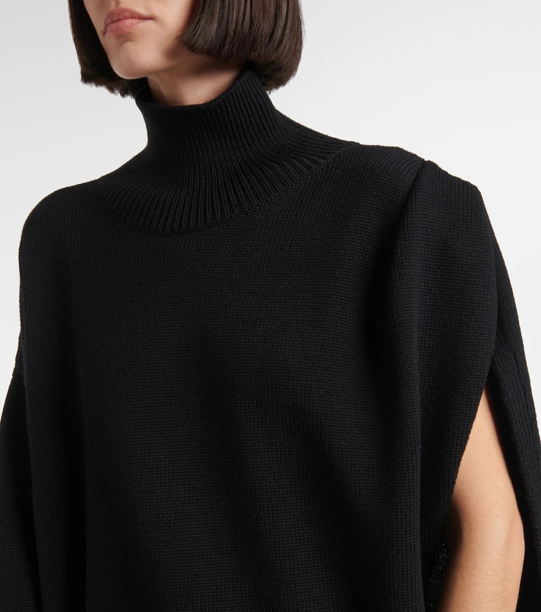 Alaïa - سترة بياقة عالية غير متناظرة ذات كاب