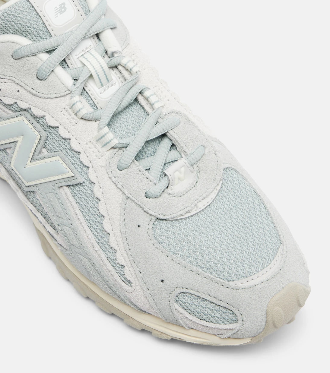 New Balance - حذاء رياضي من الجلد السويدي 204L