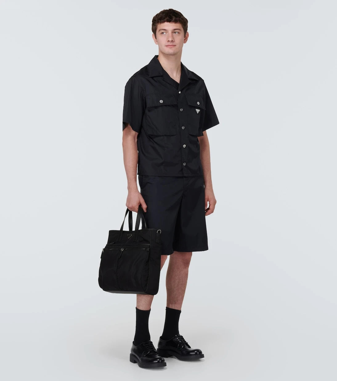 Prada - حقيبة يد توت بتصميم Re-Nylon مع حواف جلدية