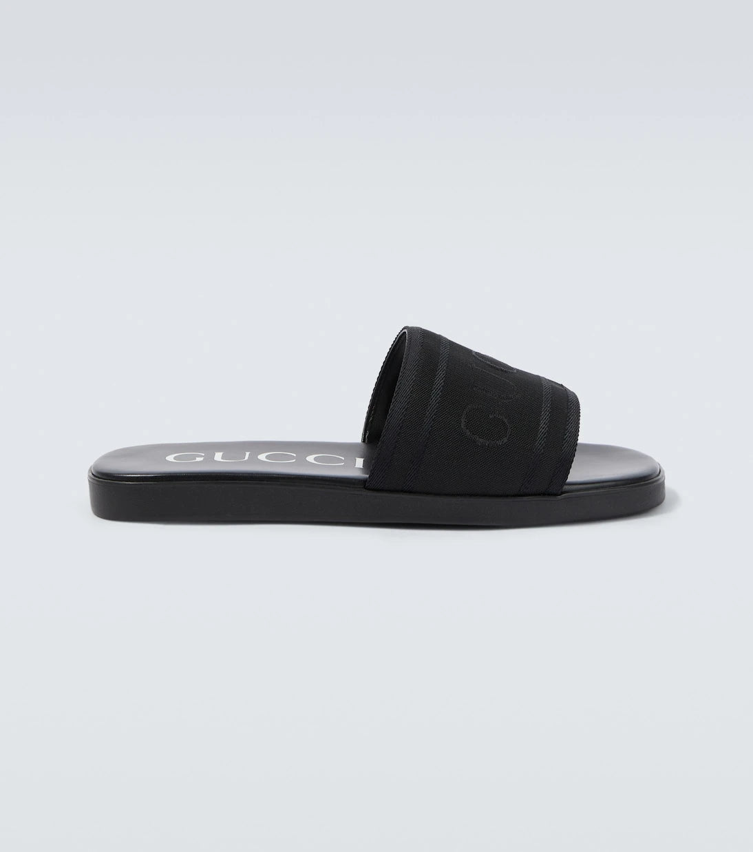 Gucci - Logo canvas and leather slides