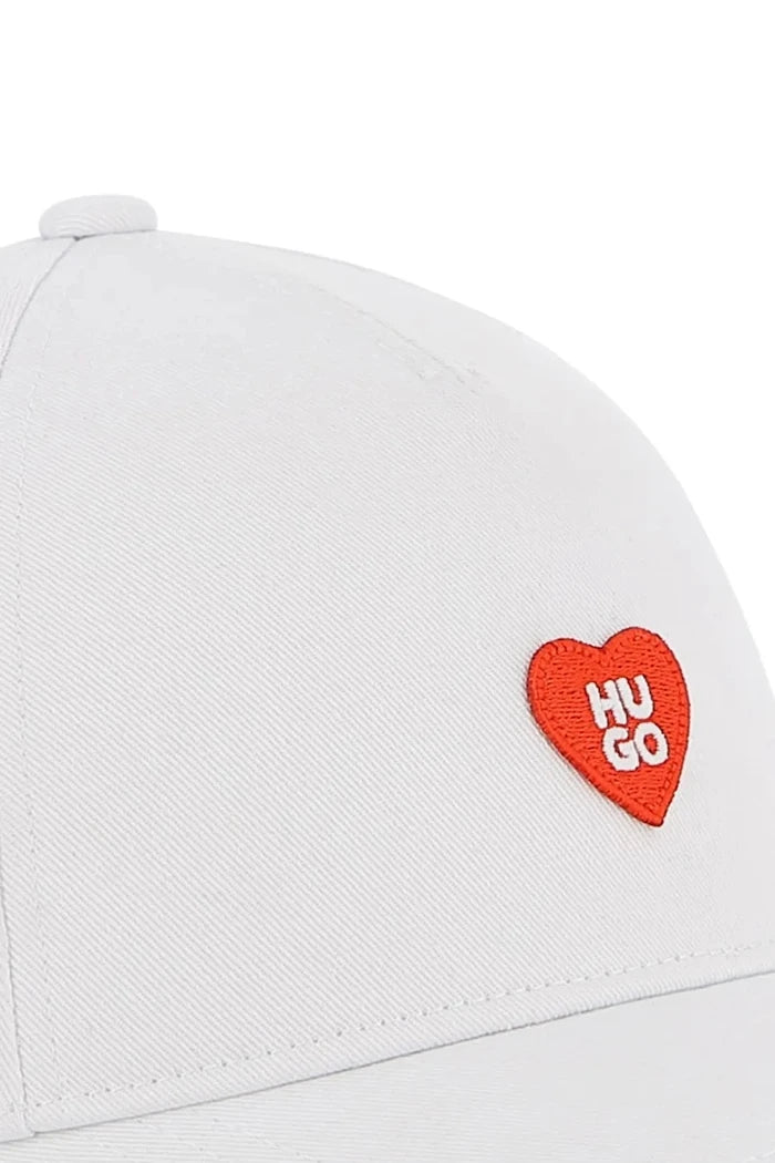 Детска памучна шапка с козирка HUGO