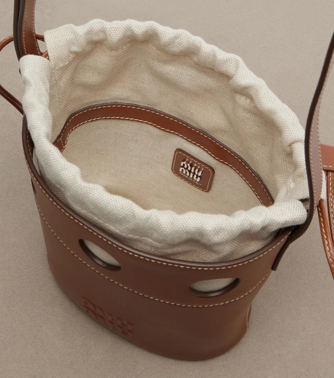 Miu Miu - Perforated leather bucket bag