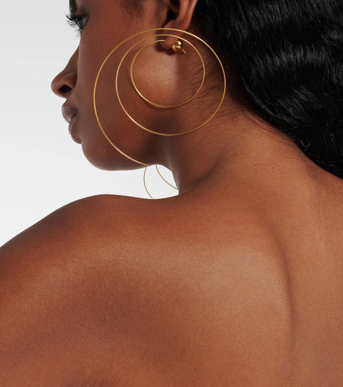 Alaïa - Thin Spiral S gold-plated stainless steel earrings