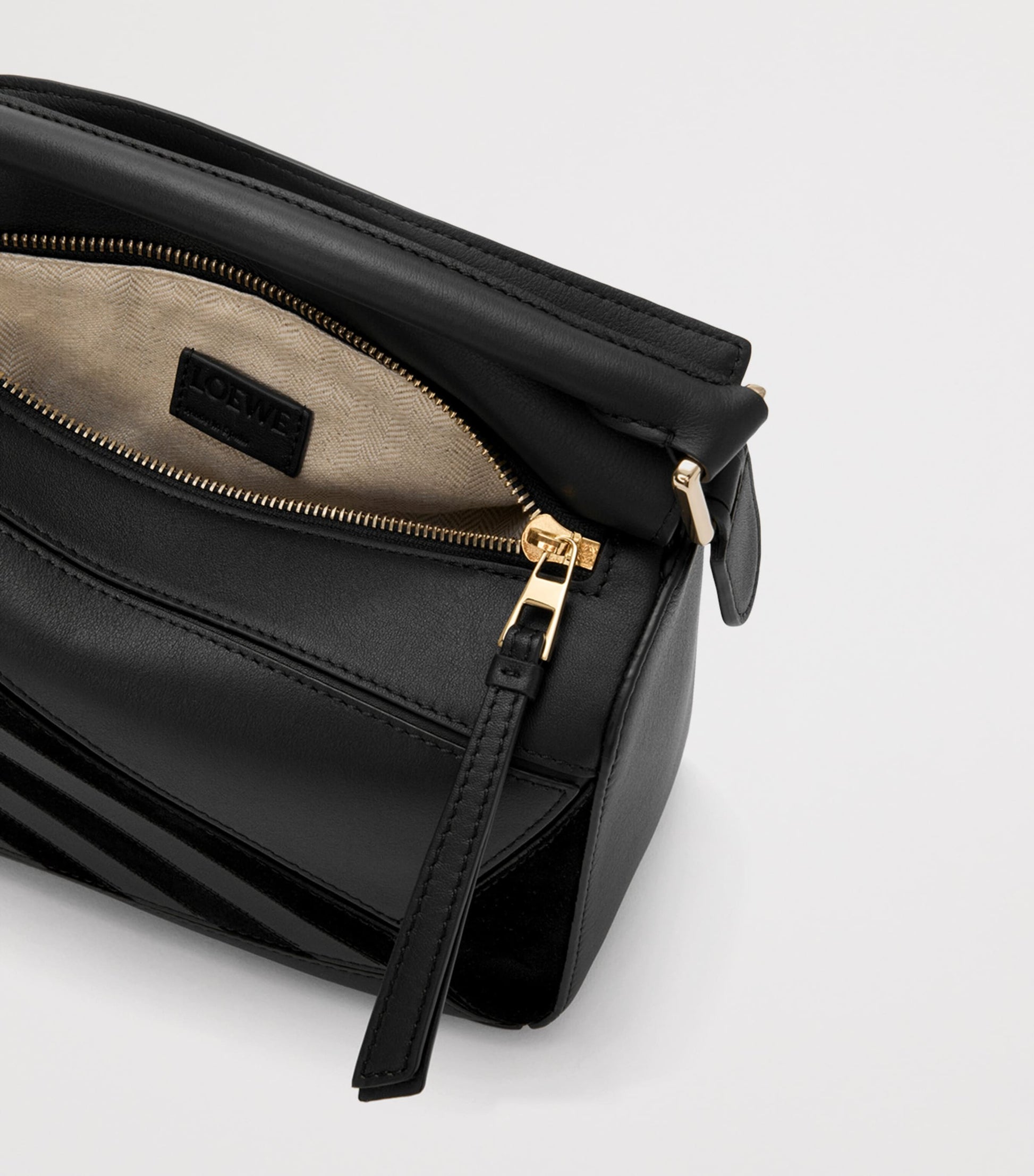 Small Leather Stripe Puzzle Edge Top-Handle Bag