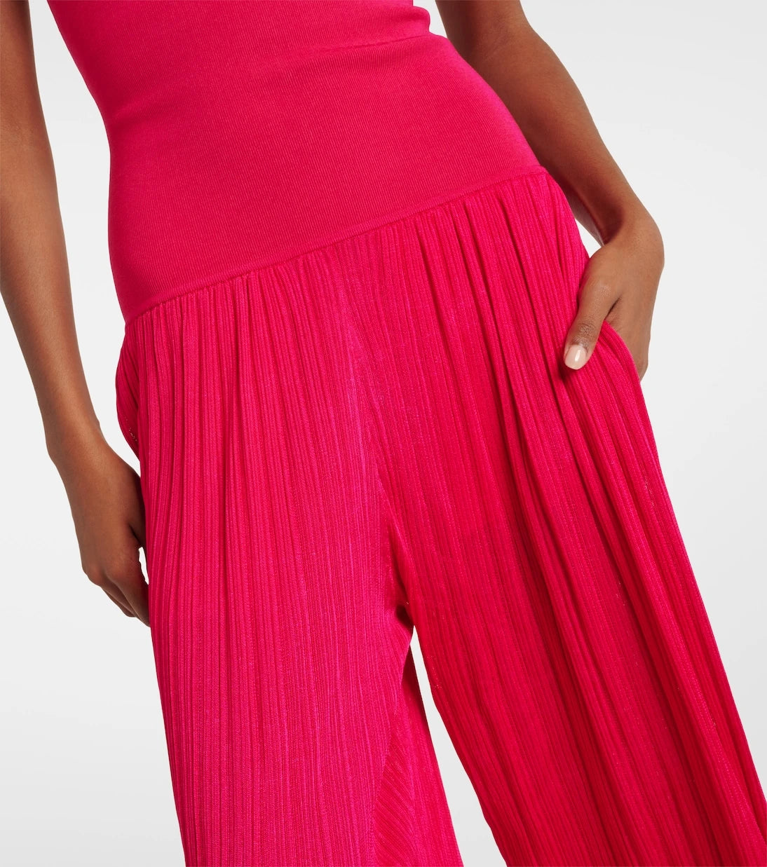 Alaïa - Strapless pleated knitted jumpsuit