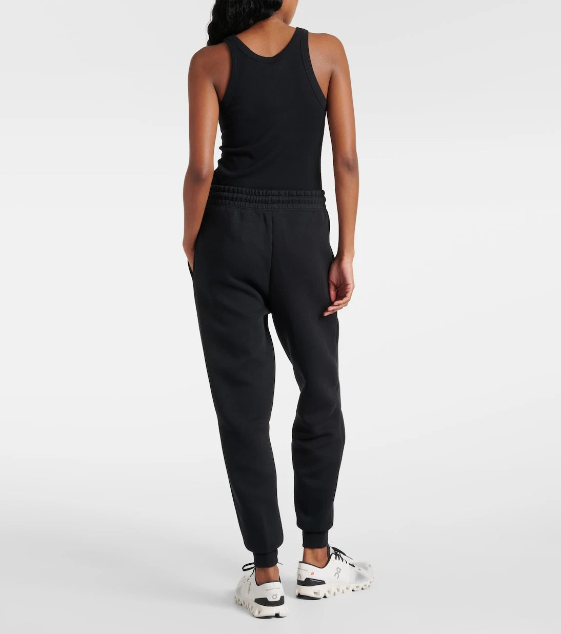 Nike - بنطال رياضي Tech Fleece بقَصَّة فضفاضة من نسيج قطني مخلوط