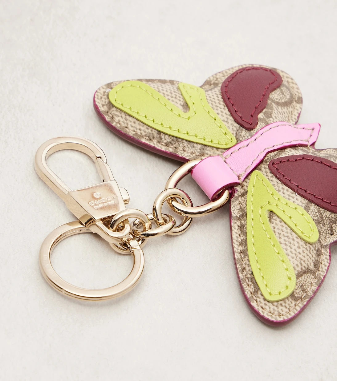 Gucci - GG leather-trimmed coated canvas bag charm