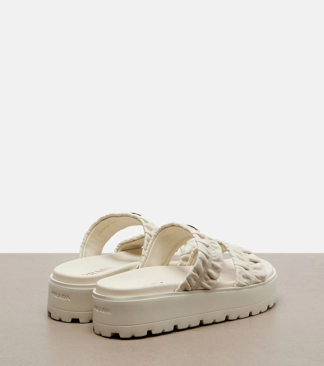 Prada - Matelassé leather platform sandals